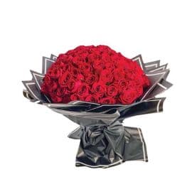 A bouquet of 100 round red roses
